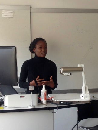 Betty Wisiki presenting her work, "An exploratory analysis of the experiences of Deaf students in accessing higher education in UK universities"